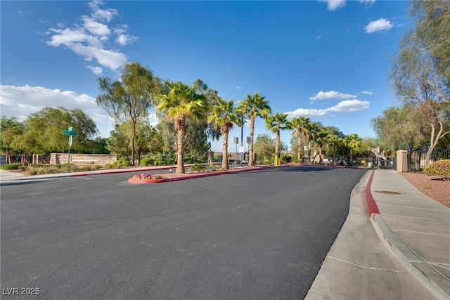 680 Moonlight Stroll St, Henderson, NV 89002 - view of asphalt street featuring sidewalks and curbs