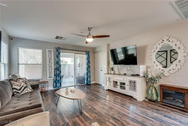 680 Moonlight Stroll St, Henderson, NV 89002 - living room featuring a ceiling fan, wood finished floors, and baseboards