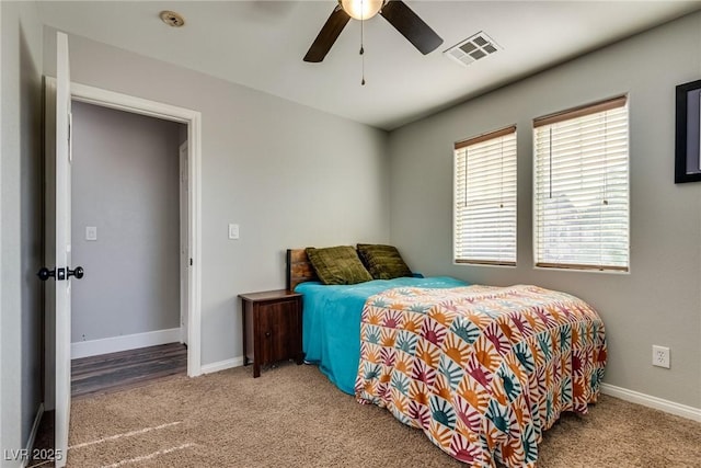 680 Moonlight Stroll St, Henderson, NV 89002 - carpeted bedroom with baseboards and a ceiling fan