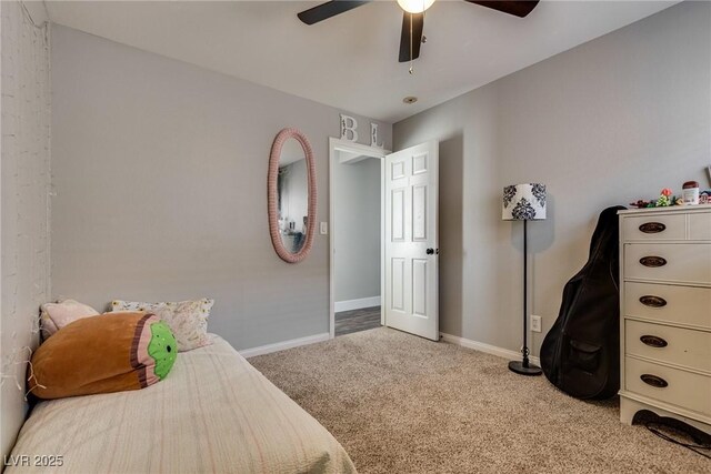 680 Moonlight Stroll St, Henderson, NV 89002 - carpeted bedroom with baseboards and ceiling fan
