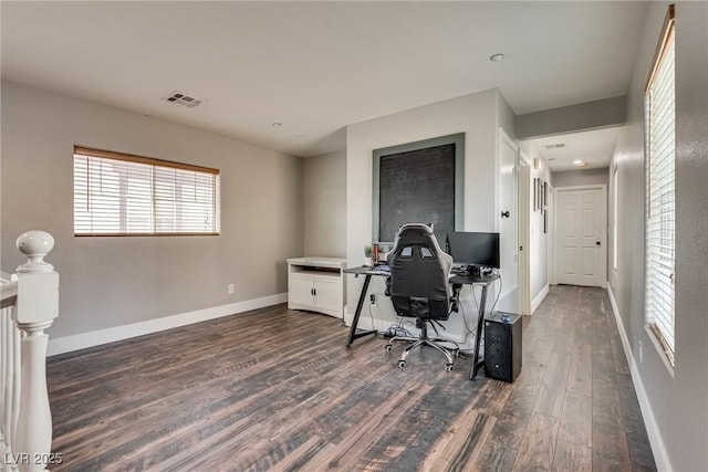 680 Moonlight Stroll St, Henderson, NV 89002 - home office featuring dark wood-style floors and baseboards