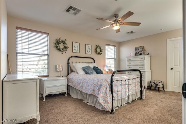 680 Moonlight Stroll St, Henderson, NV 89002 - bedroom with light colored carpet and ceiling fan