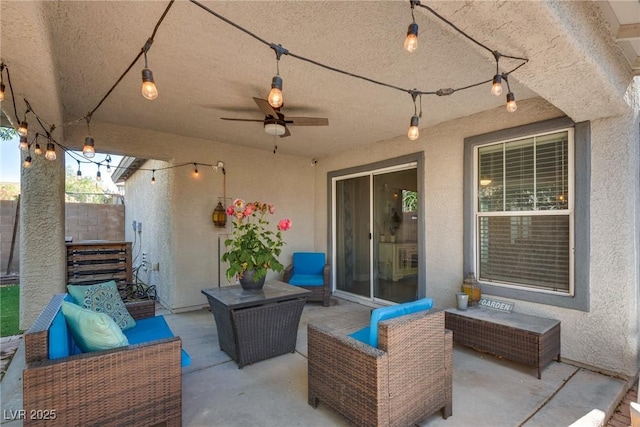 680 Moonlight Stroll St, Henderson, NV 89002 - view of patio / terrace with an outdoor hangout area, fence, and a ceiling fan