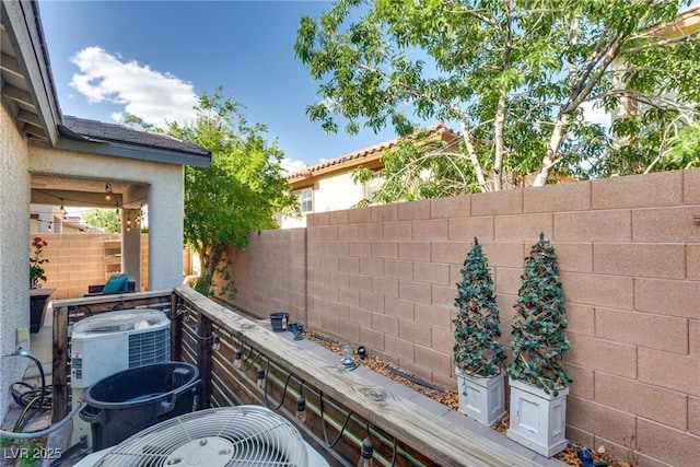 680 Moonlight Stroll St, Henderson, NV 89002 - view of patio / terrace with fence and central AC