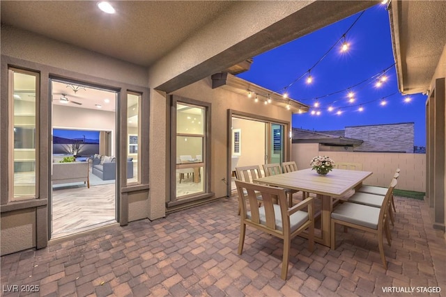 10048 Copper Edge Rd, Las Vegas, NV 89148 - patio at twilight featuring a patio area and outdoor dining area