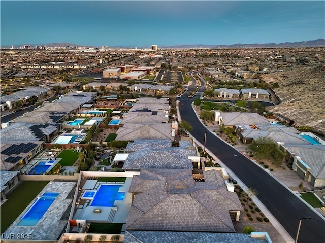 10048 Copper Edge Rd, Las Vegas, NV 89148 - aerial view of residential area featuring a mountainous background