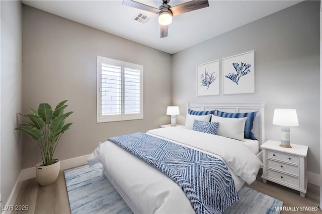 10048 Copper Edge Rd, Las Vegas, NV 89148 - bedroom featuring ceiling fan and wood finished floors