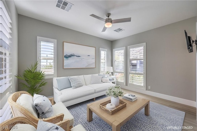 10048 Copper Edge Rd, Las Vegas, NV 89148 - living room with wood finished floors and a ceiling fan