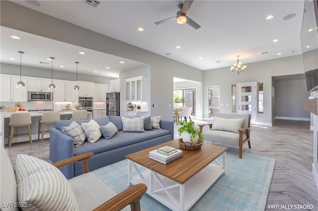 10048 Copper Edge Rd, Las Vegas, NV 89148 - living room with recessed lighting, a ceiling fan, and a chandelier