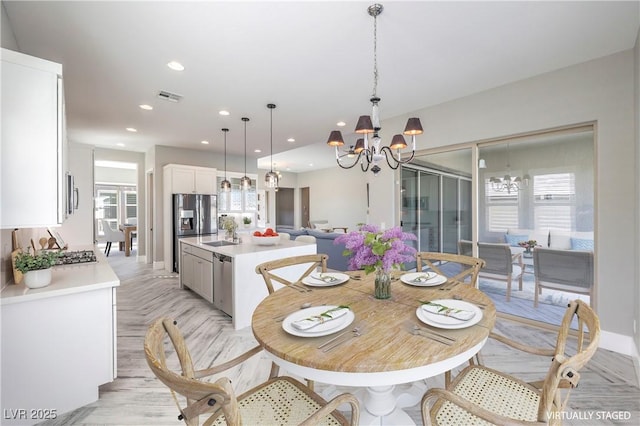 10048 Copper Edge Rd, Las Vegas, NV 89148 - dining space featuring a chandelier, plenty of natural light, and recessed lighting