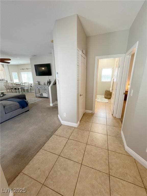 8340 Winterchase Pl, Las Vegas, NV 89143 - corridor with light tile patterned floors and baseboards