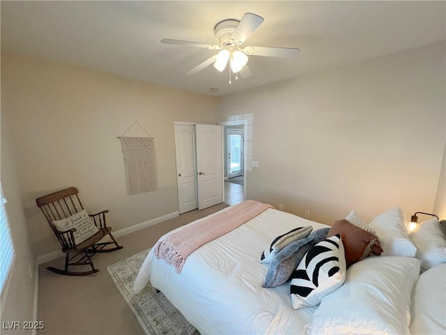 8340 Winterchase Pl, Las Vegas, NV 89143 - bedroom with carpet flooring, ceiling fan, a closet, and baseboards