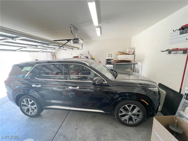 8340 Winterchase Pl, Las Vegas, NV 89143 - garage featuring a garage door opener