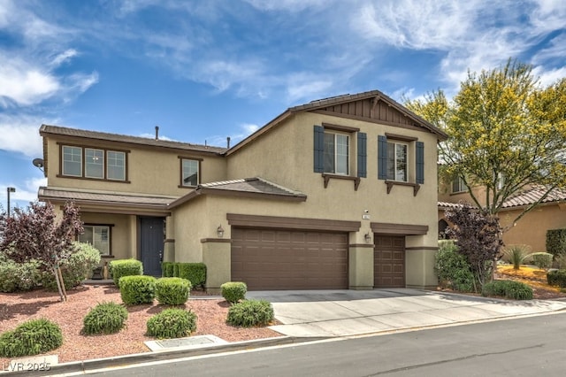 10623 Auburn Springs Ave, Las Vegas, NV 89166 - view of front of property with stucco siding, an attached garage, and concrete driveway