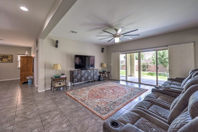 10623 Auburn Springs Ave, Las Vegas, NV 89166 - living area with ceiling fan and baseboards