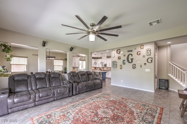 10623 Auburn Springs Ave, Las Vegas, NV 89166 - living area with a ceiling fan and stairway