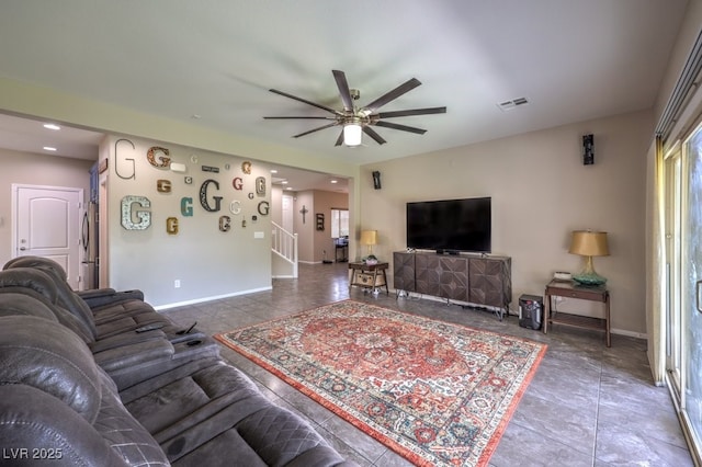 10623 Auburn Springs Ave, Las Vegas, NV 89166 - living room featuring ceiling fan, stairway, tile patterned floors, baseboards, and recessed lighting