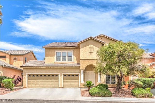 5862 Bluthe Bridge Ave, Las Vegas, NV 89141 - mediterranean / spanish-style home with a tiled roof, driveway, stucco siding, and a garage