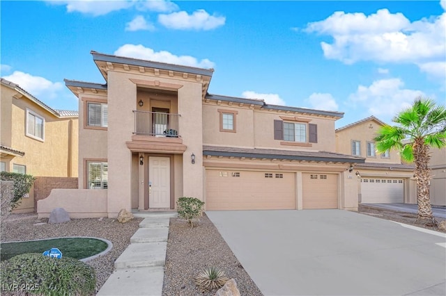 4063 Lower Saxon Ave, North Las Vegas, NV 89085 - multi unit property featuring a balcony, stucco siding, a garage, and driveway