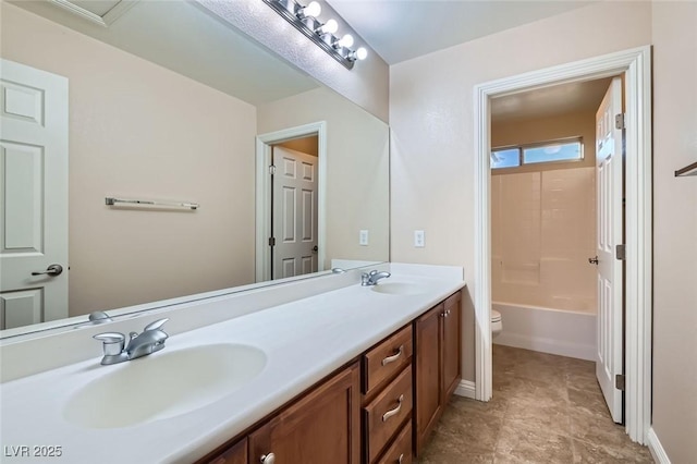 368 Misty Moonlight St, Henderson, NV 89015 - bathroom with double vanity, toilet, and baseboards