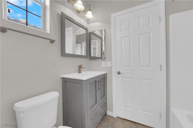 11244 Gammila Dr, Las Vegas, NV 89141 - bathroom featuring vanity, toilet, and tile patterned flooring