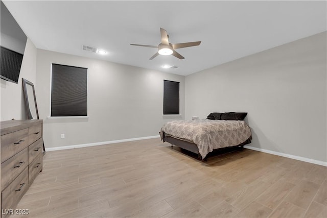 11244 Gammila Dr, Las Vegas, NV 89141 - bedroom with light wood-style flooring, baseboards, and ceiling fan