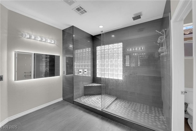 11244 Gammila Dr, Las Vegas, NV 89141 - full bathroom featuring healthy amount of natural light, toilet, a walk in shower, and baseboards