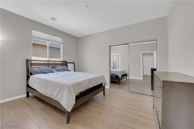 11244 Gammila Dr, Las Vegas, NV 89141 - bedroom with light wood-style flooring and baseboards