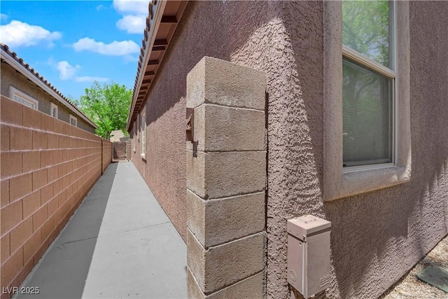 11244 Gammila Dr, Las Vegas, NV 89141 - view of property exterior with fence and stucco siding