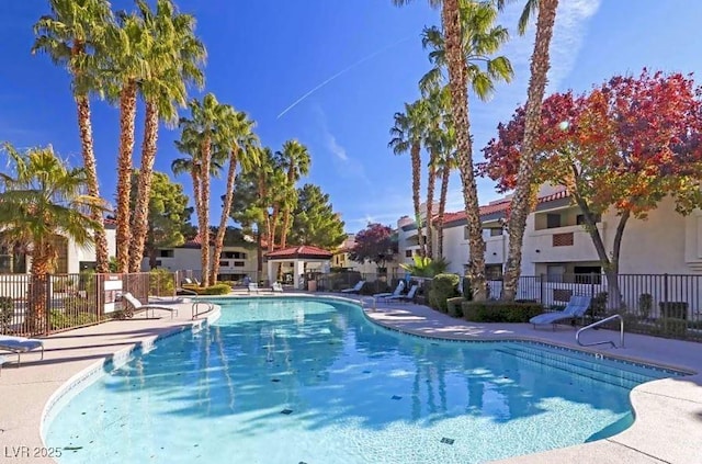 8455 W Sahara Ave Unit 213, Las Vegas, NV 89117 - community pool with a patio area and a residential view