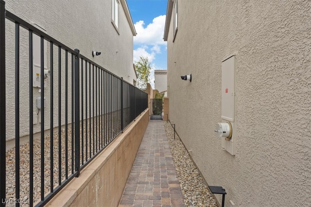 10324 Stroma Ave, Las Vegas, NV 89166 - view of side of home featuring stucco siding and fence