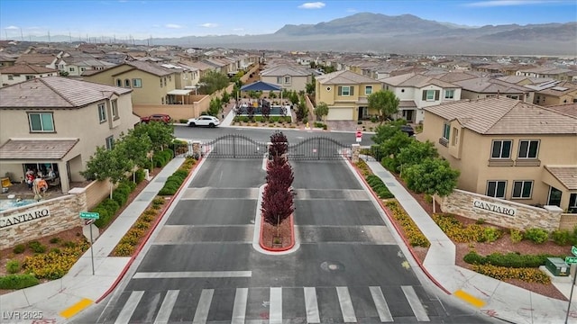 10324 Stroma Ave, Las Vegas, NV 89166 - view of community with a residential view, a gate, and a mountain view