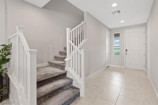 10324 Stroma Ave, Las Vegas, NV 89166 - foyer entrance with baseboards, stairs, light tile patterned floors, and recessed lighting