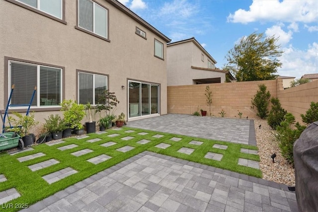 10324 Stroma Ave, Las Vegas, NV 89166 - rear view of house with a patio area and stucco siding