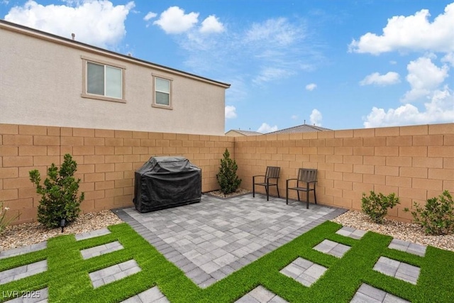 10324 Stroma Ave, Las Vegas, NV 89166 - fenced backyard with a patio area