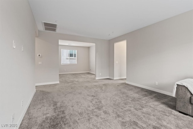10324 Stroma Ave, Las Vegas, NV 89166 - unfurnished living room with carpet floors and baseboards