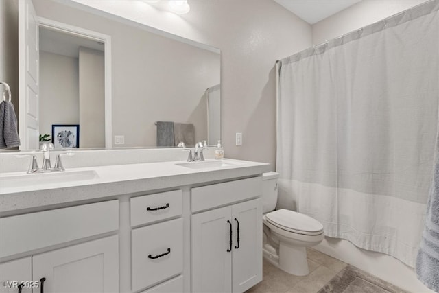 10324 Stroma Ave, Las Vegas, NV 89166 - bathroom with toilet, double vanity, tile patterned floors, and shower / bath combo