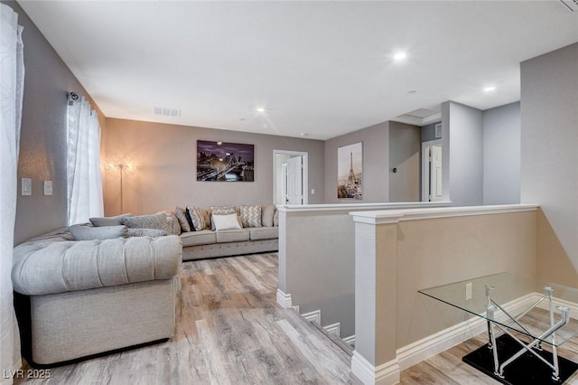 1637 Harvest Pecan Ct, Las Vegas, NV 89108 - living room with light wood-type flooring, baseboards, and recessed lighting