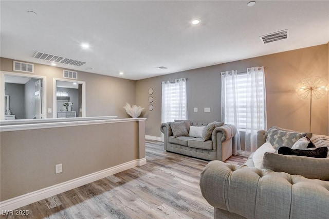 1637 Harvest Pecan Ct, Las Vegas, NV 89108 - living room with wood finished floors, baseboards, and recessed lighting