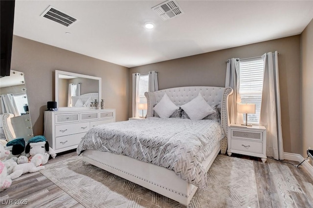 1637 Harvest Pecan Ct, Las Vegas, NV 89108 - bedroom with light wood-type flooring and baseboards
