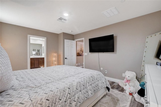 1637 Harvest Pecan Ct, Las Vegas, NV 89108 - bedroom with wood finished floors, baseboards, and recessed lighting