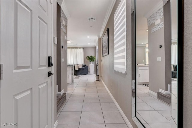 1637 Harvest Pecan Ct, Las Vegas, NV 89108 - hall featuring light tile patterned floors, crown molding, and baseboards