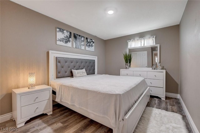 1637 Harvest Pecan Ct, Las Vegas, NV 89108 - bedroom featuring wood finished floors and baseboards