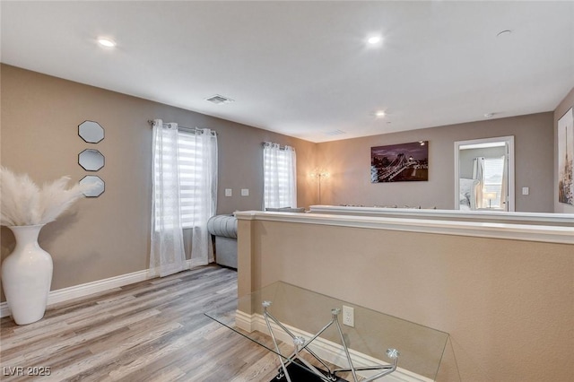 1637 Harvest Pecan Ct, Las Vegas, NV 89108 - corridor featuring light wood-type flooring, baseboards, and recessed lighting