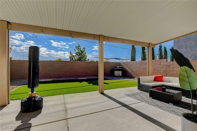 1637 Harvest Pecan Ct, Las Vegas, NV 89108 - view of patio featuring a fenced backyard and an outdoor living space