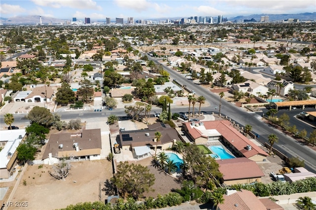 3075 Santa Margarita St, Las Vegas, NV 89146 - aerial view of residential area featuring a pool and a skyline view