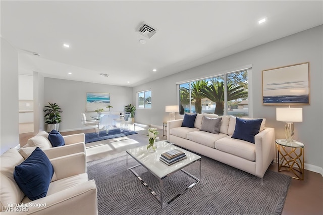 3075 Santa Margarita St, Las Vegas, NV 89146 - living room featuring recessed lighting and baseboards