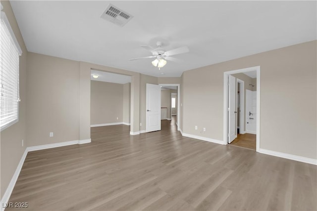 125 Sharp Edge Ave, North Las Vegas, NV 89031 - spare room featuring a ceiling fan, light wood-type flooring, and baseboards