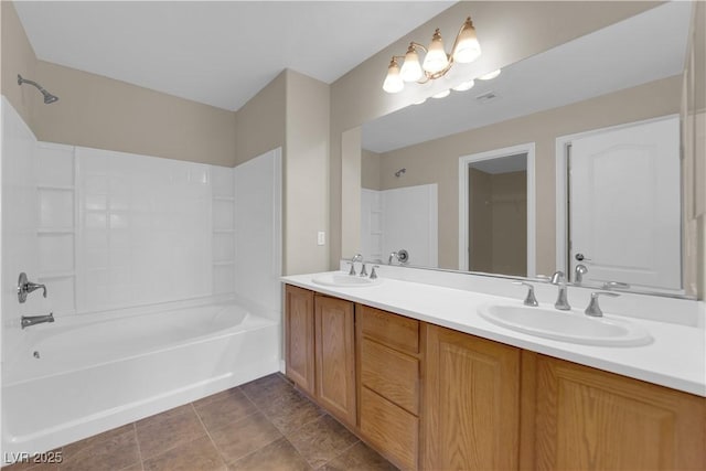 125 Sharp Edge Ave, North Las Vegas, NV 89031 - bathroom with double vanity and washtub / shower combination