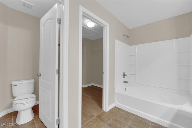 125 Sharp Edge Ave, North Las Vegas, NV 89031 - full bath with toilet,  shower combination, baseboards, and tile patterned flooring